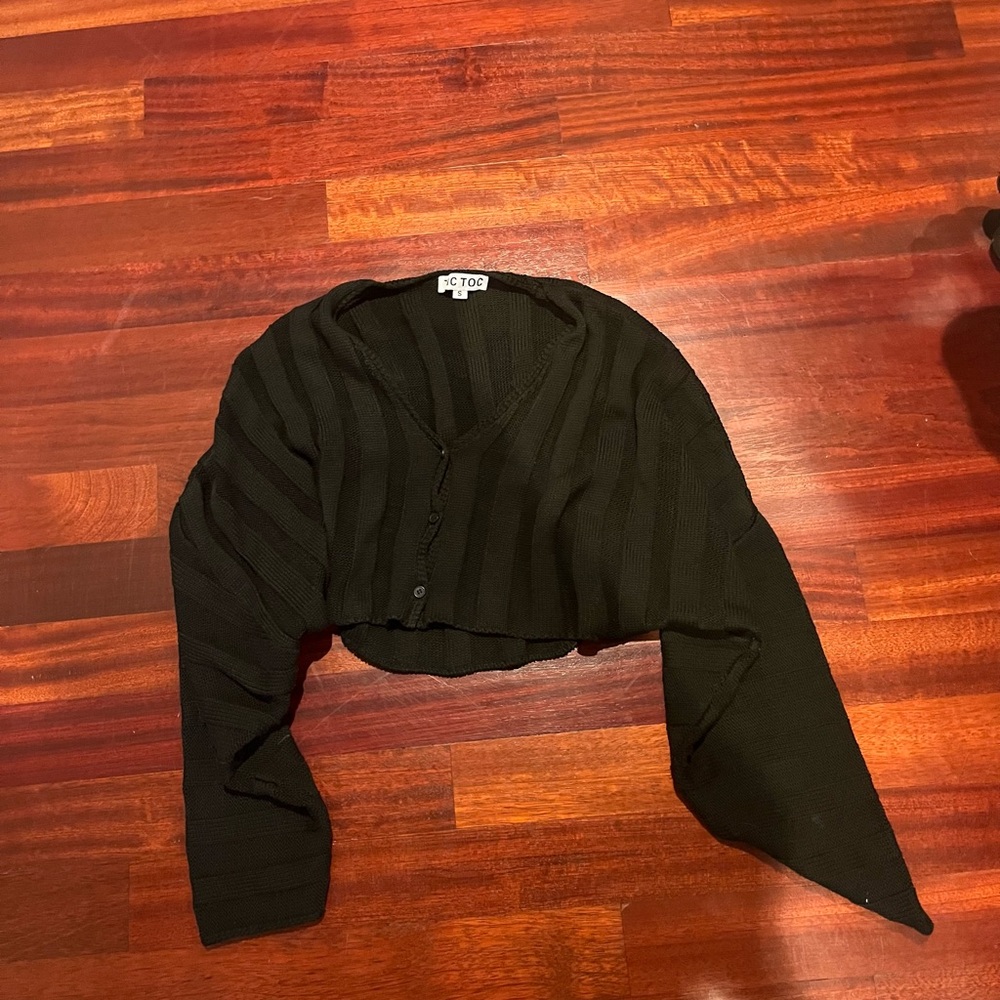 Black cropped sweater.